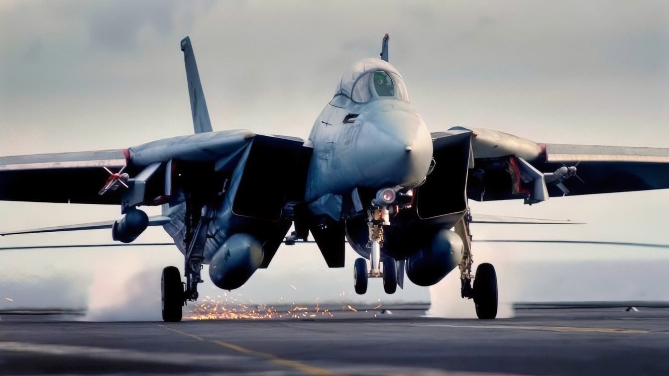 Pacific Ocean (Nov. 15, 2003) -- An F-14D Tomcat from the "Tomcatters" of Fighter Squadron Three One (VF-31) makes an arrested landing aboard USS John C. Stennis (CVN 74). Stennis and her embarked Carrier Air Wing Fourteen (CVW-14) are at sea conducting Composite Training Unit Exercise (COMPTUEX) in preparation for an upcoming deployment. U.S. Navy photo by Photographer's Mate 3rd Class Mark J. Rebilas.