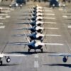 U.S. Air Force F-22 Raptors, E-3 Sentrys, C-17 Globemaster IIIs, C-130J Herculeses and C-12F Hurons participate in a close formation taxi known as an elephant walk at Joint Base Elmendorf-Richardson, Alaska, May 5, 2020. This event displayed the ability of the 3rd Wing, 176th Wing and the 477th Fighter Group to maintain constant readiness throughout COVID-19 by Total Force Integration between active-duty, Guard and Reserve units to continue defending the U.S. homeland and ensuring a free and open Indo-Pacific. (U.S. Air Force photo by Senior Airman Jonathan Valdes Montijo)