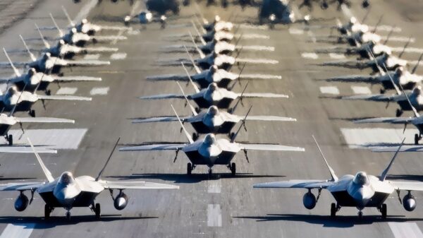 U.S. Air Force F-22 Raptors, E-3 Sentrys, C-17 Globemaster IIIs, C-130J Herculeses and C-12F Hurons participate in a close formation taxi known as an elephant walk at Joint Base Elmendorf-Richardson, Alaska, May 5, 2020. This event displayed the ability of the 3rd Wing, 176th Wing and the 477th Fighter Group to maintain constant readiness throughout COVID-19 by Total Force Integration between active-duty, Guard and Reserve units to continue defending the U.S. homeland and ensuring a free and open Indo-Pacific. (U.S. Air Force photo by Senior Airman Jonathan Valdes Montijo)
