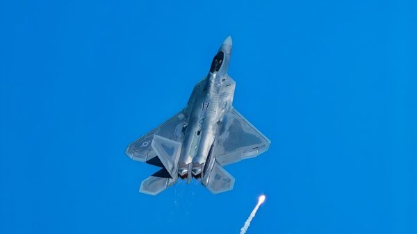 An F-22 Raptor fighter jet assigned to the 433rd Weapons Squadron pops flares during the Aviation Nation 2019 air show at Nellis Air Force Base, Nevada, Nov. 16, 2019. The F-22’s combination of stealth, supercruise, maneuverability, and integrated avionics, coupled with improved supportability, represents an exponential leap in warfighting capabilities. (U.S. Air Force photo by Airman 1st Class Bryan Guthrie)