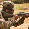 Service members from several different partner nations shoot the M32 and M79 grenade launchers loaded with non-lethal ammunition during Exercise Tradewinds 2016, at Twickenham Park Gallery Range, Jamaica, June 24, 2016. Tradewinds will include both maritime and land phases, which will further enhance opportunities for participating countries to improve their security and disaster relief assistance. (U.S. Marine Corps photo by Cpl. Justin T. Updegraff/ Released)