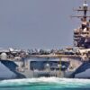 STRAIT OF HORMUZ (May 11, 2012) The guided-missile cruiser USS Cape St. George (CG 71) and the aircraft carrier USS Abraham Lincoln (CVN 72) transit the Strait of Hormuz.