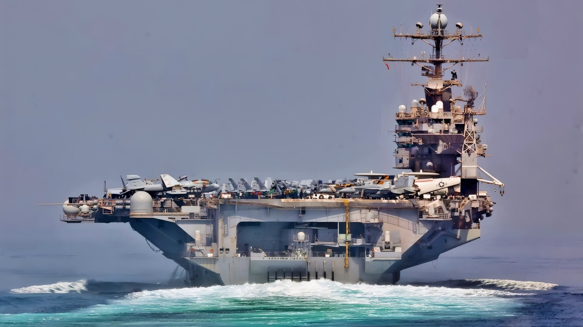 STRAIT OF HORMUZ (May 11, 2012) The guided-missile cruiser USS Cape St. George (CG 71) and the aircraft carrier USS Abraham Lincoln (CVN 72) transit the Strait of Hormuz.