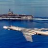 US Navy Aircraft Carrier and Russian Tu-16 Bomber