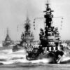 Battleships and heavy cruisers steam in column off Kamaishi, at the time they bombarded the iron works there, as seen from USS South Dakota (BB-57). USS Indiana (BB-58) is the nearest ship, followed by USS Massachusetts (BB-59). Cruisers Chicago (CA-136) and Quincy (CA-71) bring up the rear. Official U.S. Navy Photograph, now in the collections of the National Archives.