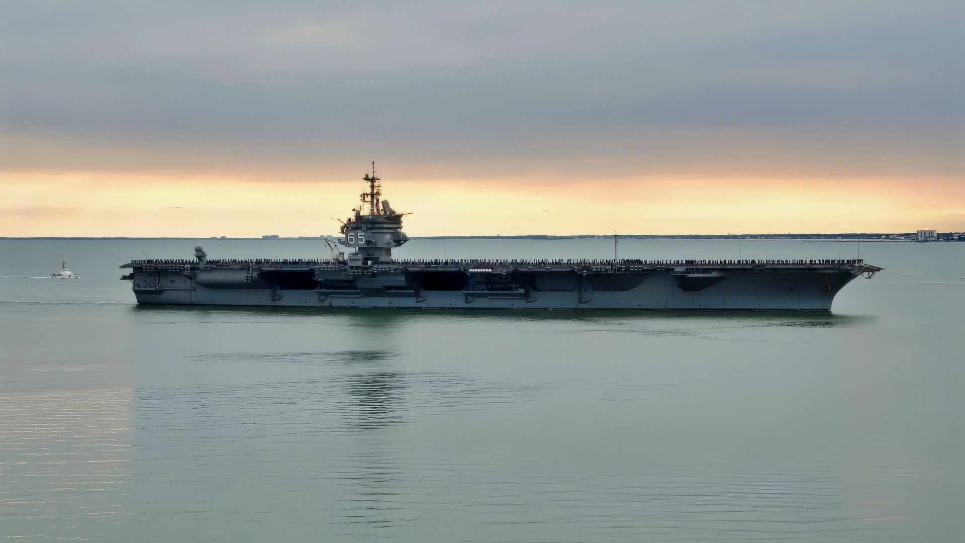 (Nov. 4, 2012) The aircraft carrier USS Enterprise (CVN 65) passes Fort Monroe National Monument as the ship arrives at Naval Station Norfolk. Enterprise’s return to Norfolk will be the 25th and final homecoming of her 51 years of distinguished service. Enterprise deployed as part of Carrier Strike Group (CSG) 12 in support of maritime security operations (MSO) and theater security cooperation (TSC) efforts in the U.S. Navy’s 5th, 6th and 7th Fleet areas of responsibility. (U.S. Navy photo by Mass Communication Specialist 1st Class Julie Matyascik/Released)