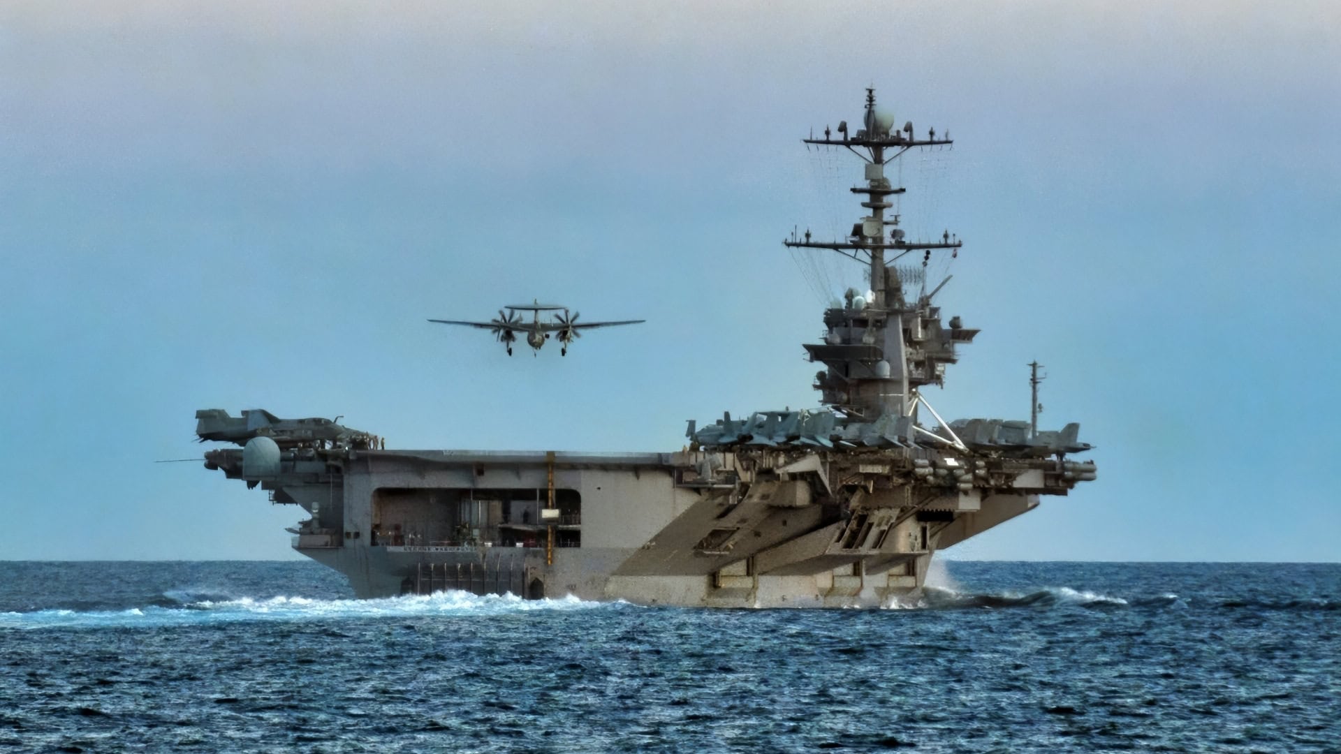 (July 18, 2011) TIMOR SEA An E-2C Hawkeye approaches the flight deck of USS George Washington (CVN 73), after participating in a simulated air strike over Australia. George Washington is participating in Talisman Saber 2011, a bilateral exercise intended to enhance planning and readiness between Australia and the U.S. (U.S. Navy photo by Mass Communication Specialist 3rd Class Andrew Ryan Smith/Released)