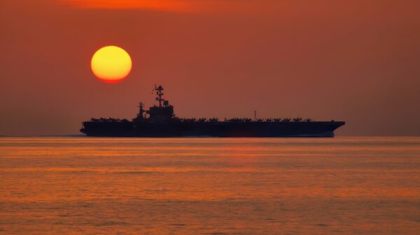 The aircraft carrier USS John C. Stennis (CVN 74) operates in the Arabian Sea during sunset on Jan. 5, 2013. The John C. Stennis Strike Group is deployed to the 5th Fleet area of responsibility to conduct maritime security operations and theater security cooperation efforts. DoD photo by Petty Officer 3rd Class James Stahl, U.S. Navy. (Released)