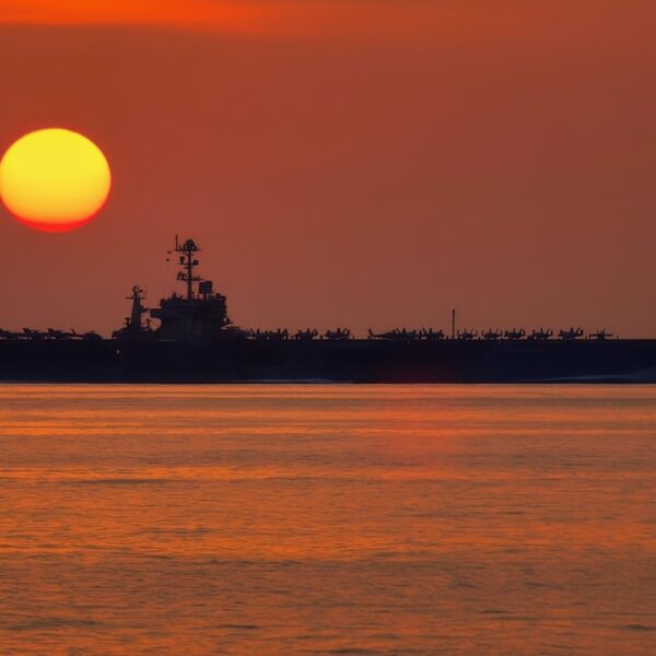 The aircraft carrier USS John C. Stennis (CVN 74) operates in the Arabian Sea during sunset on Jan. 5, 2013. The John C. Stennis Strike Group is deployed to the 5th Fleet area of responsibility to conduct maritime security operations and theater security cooperation efforts. DoD photo by Petty Officer 3rd Class James Stahl, U.S. Navy. (Released)