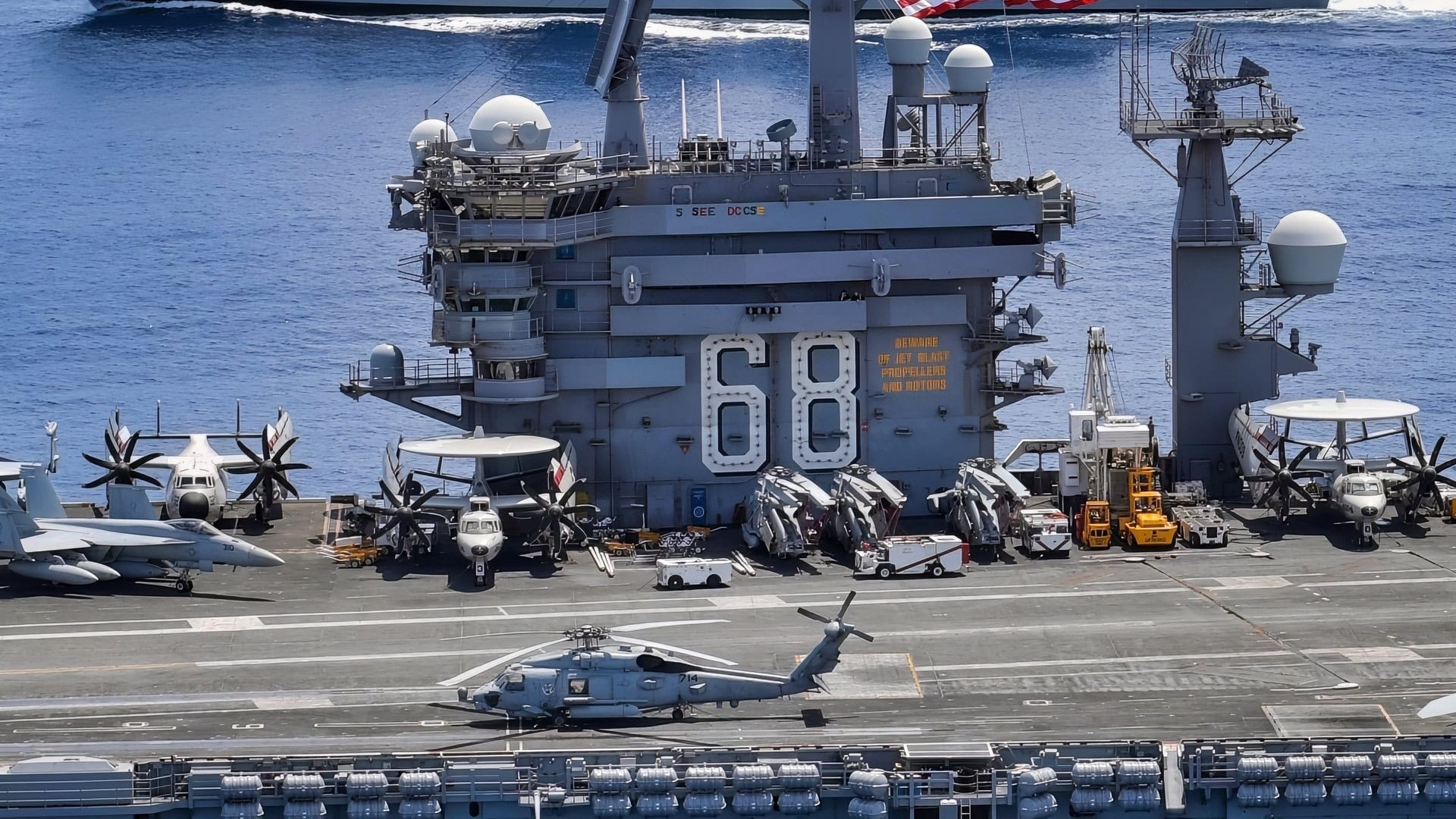 INDIAN OCEAN (July 20, 2020) The Nimitz Carrier Strike Group, consisting of flagship USS Nimitz (CVN 68), Ticonderoga-class guided missile cruiser USS Princeton (CG 59), and Arleigh Burke-class guided missile destroyers USS Sterett (DDG 104), and USS Ralph Johnson (DDG 114), along with Indian Navy ships Rana, Sahyardi, Shivalik and Kamorta, steam in formation during a cooperative deployment in the Indian Ocean July 20. (U.S. Navy photo by Mass Communication Specialist 3rd Class Jose Madrigal)