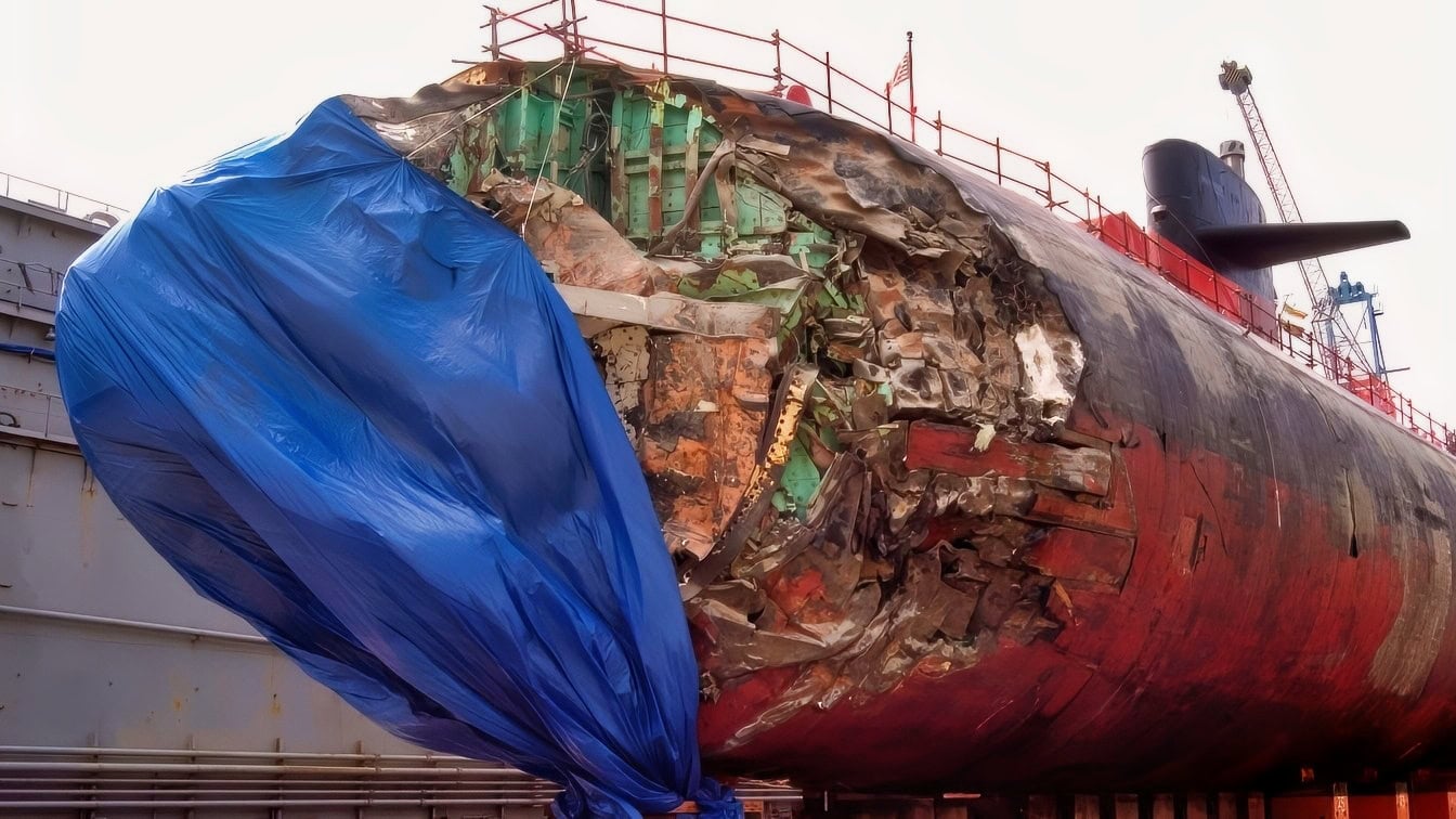 Apra Harbor, Guam (Jan. 27, 2005) – The Los Angeles-class fast-attack submarine USS San Francisco (SSN 711) in dry dock to assess damage sustained after running aground approximately 350 miles south of Guam Jan. 8, 2005. . The Navy former dry dock known as “Big Blue” is capable of docking ships that weigh up to 40,000 Long Tons. The Navy certified Big Blue for the one-time docking of San Francisco. San Francisco is the second fast-attack submarine to be attached to the forward-deployed Submarine Squadron Fifteen, home ported on board Naval Base Guam. U.S. Navy photo by Photographer's Mate 2nd Class Mark Allen Leonesio (RELEASED)