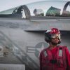 A U.S. Sailor checks ordnance on an F/A-18 Super Hornet, attached to Strike Fighter Squadron (VFA) 102, on the flight deck of Nimitz-class aircraft carrier USS George Washington (CVN 73), Sept. 13, 2026. George Washington is deployed to the U.S. 5th Fleet area of operations to support maritime security and stability in the Middle East. (U.S. Navy photo)