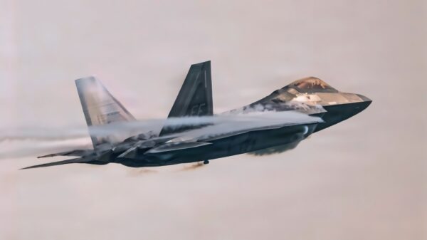 U.S. Air Force Capt. Nick “Laz” Le Tourneau, pilot and commander of the F-22 Raptor Aerial Demonstration Team, performs an aerial demonstration for the Chicago Air and Water Show in Chicago, Illinois, August 14, 2026. The F-22 is designed to perform high-performance maneuvers that showcase its maneuverability and control in flight. The visible vapor forms when rapid changes in air pressure and humidity around the aircraft cause water vapor in the air to condense. (U.S. Air Force photo by Staff Sgt. Mary Bowers)