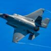 U.S. Air Force pilot Maj. Brian 'Brass' Burke, 104th Fighter Wing unit conversion officer, flies an F-35A Lightning II over Barnes Air National Guard Base at exactly 1:04PM EST, officially marking the historic first arrival of the fifth-generation fighter aircraft to the Wing, June 11, 2026.