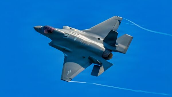 U.S. Air Force pilot Maj. Brian 'Brass' Burke, 104th Fighter Wing unit conversion officer, flies an F-35A Lightning II over Barnes Air National Guard Base at exactly 1:04PM EST, officially marking the historic first arrival of the fifth-generation fighter aircraft to the Wing, June 11, 2026.