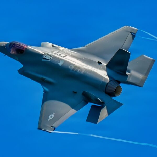 U.S. Air Force pilot Maj. Brian 'Brass' Burke, 104th Fighter Wing unit conversion officer, flies an F-35A Lightning II over Barnes Air National Guard Base at exactly 1:04PM EST, officially marking the historic first arrival of the fifth-generation fighter aircraft to the Wing, June 11, 2026.