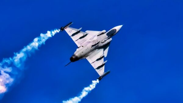 A Hungarian Air Force JAS-39 Gripen aircraft deploys a flare during an aerial demonstration at the Airpower 22 air show in Zeltweg, Austria, Sept. 2, 2022. This multi-national event showcased the capabilities of over 20 nations to over 275,000 spectators from around the world, and provided an opportunity for the U.S. Air Force to continue to strengthen international partnerships. (U.S. Air Force photo by Staff Sgt. Kevin Long)