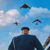 A U.S. Air Force tri-bomber formation consisting of a B-2 Spirit, B-1B Lancer and B-52H Stratofortress flies over the IndyCar Freedom 250 Grand Prix in Washington, D.C., Aug. 23, 2026, in celebration of the 250th anniversary of the United States.