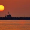 US Navy Aircraft Carrier At Sunset Creative Commons Photo