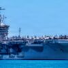 Nimitz-class aircraft carrier USS Theodore Roosevelt (CVN 71) returns to Joint Base Pearl Harbor-Hickam to participate in the final events of Exercise Rim of the Pacific 2026, July 28, 2026. Thirty nations, 30 ships, five submarines, 15 national land forces, more than 190 aircraft and more than 30,000 personnel are participating in RIMPAC in and around the Hawaiian Islands, June 24 to July 31. The world's largest international maritime exercise, RIMPAC provides a unique training opportunity while fostering and sustaining cooperative relationships among participants critical to ensuring the safety of sea lanes and security on the world's oceans. RIMPAC 2026 is the 30th exercise in the series that began in 1971. (U.S. Navy photo by Mass Communication Specialist Seaman Mark Bergado)