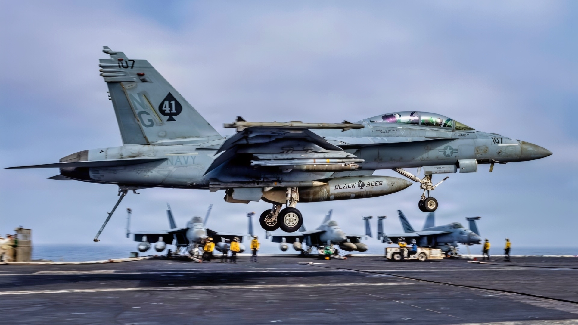 An F/A-18F Super Hornet, assigned to Strike Fighter Squadron (VFA) 41, prepares to make an arrested landing on the flight deck of Nimitz-class aircraft carrier USS Abraham Lincoln (CVN 72), Aug. 4, 2026. Abraham Lincoln is deployed to the U.S. 5th Fleet area of operations to support maritime security and stability in the Middle East. (U.S. Navy photo)