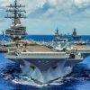 The aircraft carrier USS Ronald Reagan (CVN 76) leads a close formation of 42 ships and submarines from 15 international partner nations during Rim of the Pacific (RIMPAC) Exercise 2014. Twenty-two nations, 49 ships, six submarines, more than 200 aircraft and 25,000 personnel are participating in RIMPAC exercise from June 26 to Aug. 1, in and around the Hawaiian Islands. The world's largest international maritime exercise, RIMPAC provides a unique training opportunity that helps participants foster and sustain the cooperative relationships that are critical to ensuring the safety of sea lanes and security on the world's oceans. RIMPAC 2014 is the 24th exercise in the series that began in 1971. (U.S. Navy photo by Mass Communication Specialist 2nd Class Jacob Estes/Released)