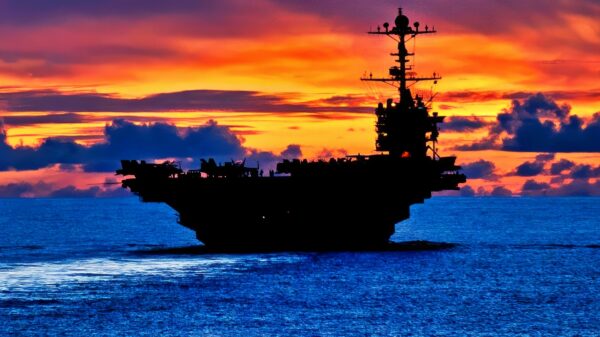 (Sept. 08, 2012) The forward deployed aircraft carrier USS George Washington (CVN 73) sails through calm seas near Guam at sunset. George Washington is the centerpiece of Carrier Strike Group FIVE, the US Navy’s only continuously forward deployed carrier strike group, based out of Yokosuka, Japan. Carrier Strike Group FIVE is currently on a routine Western Pacific patrol. (U.S. Navy photo by Mass Communication Specialist 3rd Class Paul Kelly/ Released)