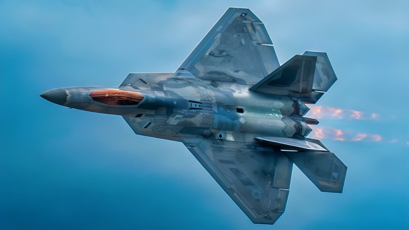 Afterburners are lit as an F-22 Raptor performs at the Cold Lake Airshow in Cold Lake, Alberta, Canada, July 18, 2026. Powered by two Pratt & Whitney F119 engines producing a combined 70,000 pounds of thrust, the aircraft showcases unmatched speed, maneuverability, and air dominance capability. (U.S. Air Force photo by Staff Sgt. Lauren Diaz)