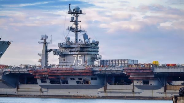 NORFOLK, Va. (Sept. 30, 2026) The Nimitz-class aircraft carrier USS Harry S. Truman (CVN 75) departs Naval Station Norfolk for Newport News Shipbuilding to begin the shipyard phase of its Refueling and Complex Overhaul (RCOH). RCOH is a once-in-a-carrier-lifetime maintenance and modernization period designed to prepare Truman for the second half of its planned 50-year service life. (U.S. Navy photo by Mass Communication Specialist Seaman Apprentice Jason Wernegreen)