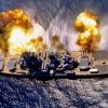 USS Iowa (BB-61) Fires a full broadside of nine 16/50 and six 5/38 guns during a target exercise near Vieques Island, Puerto Rico, 1 July 1984. Photographed by PHAN J. Alan Elliott. Note concussion effects on the water surface, and 16-inch gun barrels in varying degrees of recoil. Official U.S. Navy Photograph, from the the Department of Defense Still Media Collection.