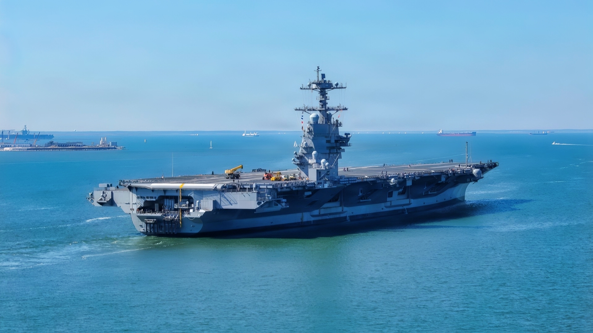 The future USS John F. Kennedy (CVN 79) transits to Naval Station Norfolk, Virginia, October 2, 2026, following her departure from HII's Newport News Shipbuilding division in Newport News, Virginia, after four days at sea. John F. Kennedy is the second Gerald R. Ford-class aircraft carrier, representing the next generation of U.S. Navy aircraft carrier capabilities and supporting the Navy's commitment to maintaining maritime superiority and global readiness. (U.S. Navy photo by Mass Communication Specialist 2nd Class Julianna Lynch)